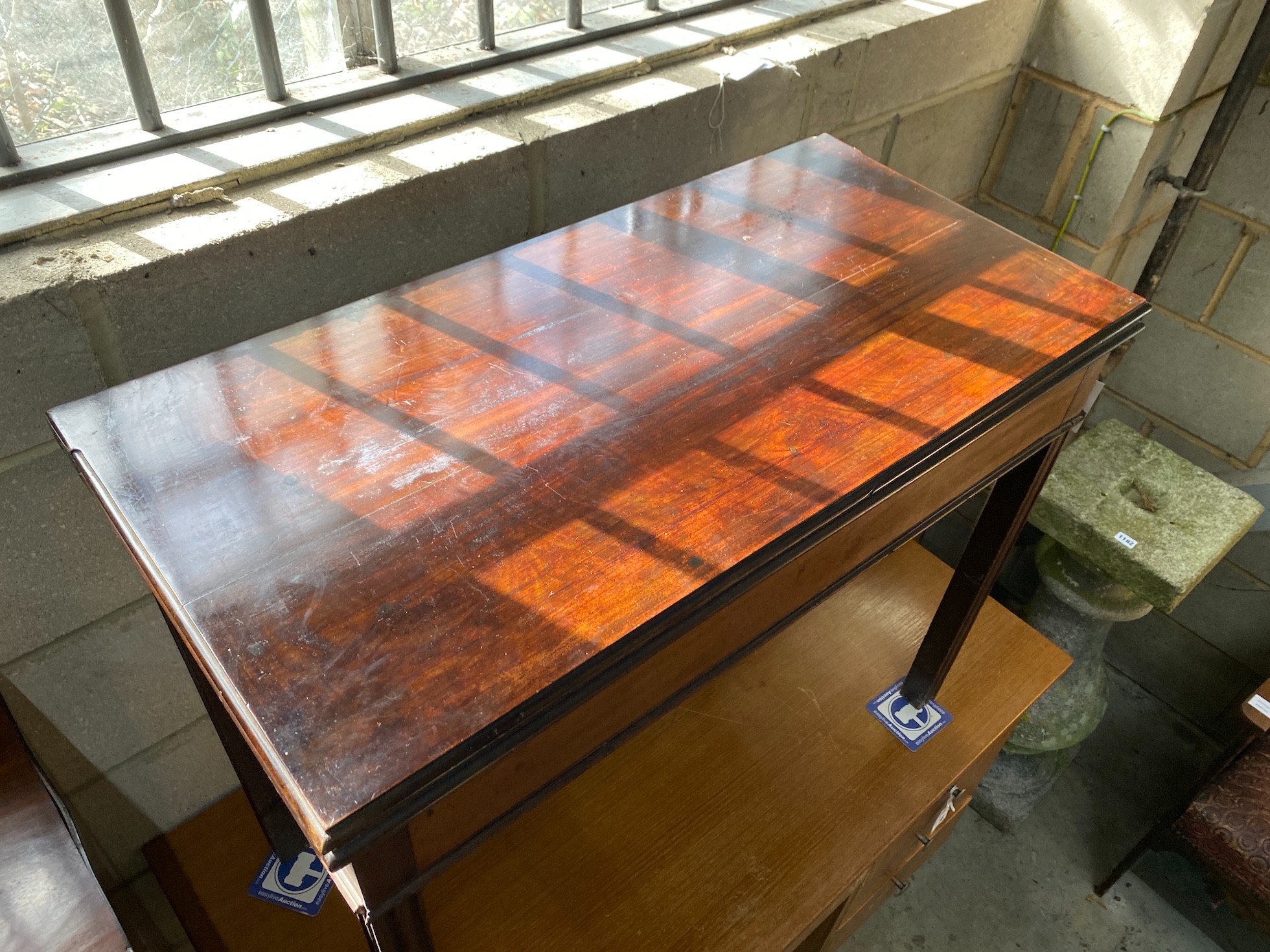 A George III rectangular mahogany folding card table, width 90cm, depth 45cm, height 71cm